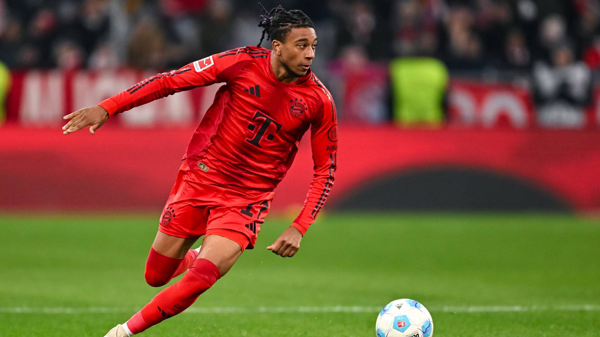 Michael Olise of FC Bayern München in action during the Bundesliga match between vs Leipzig