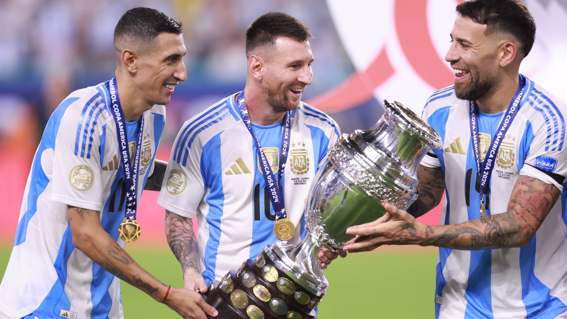 Angel Di Maria, Lionel Messi and Nicolas Otamendi of Argentina