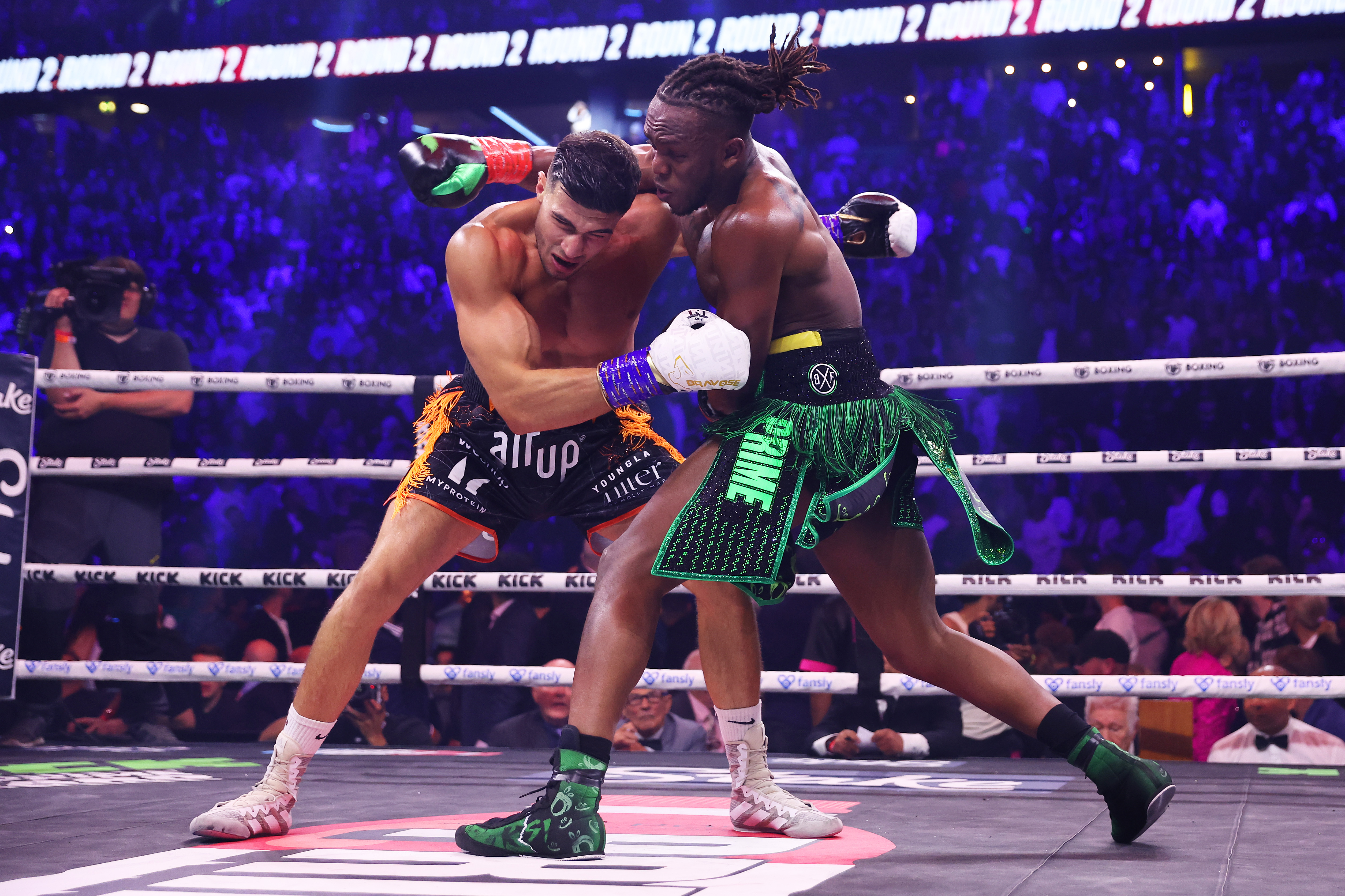 KSI (Olajide Olayinka Williams) and Tommy Fury clinch during the Misfits Cruiserweight fight
