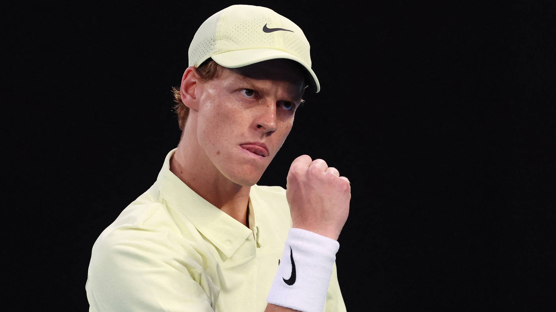 Italy's Jannik Sinner reacts on a point against Australia's Tristan Schoolkate