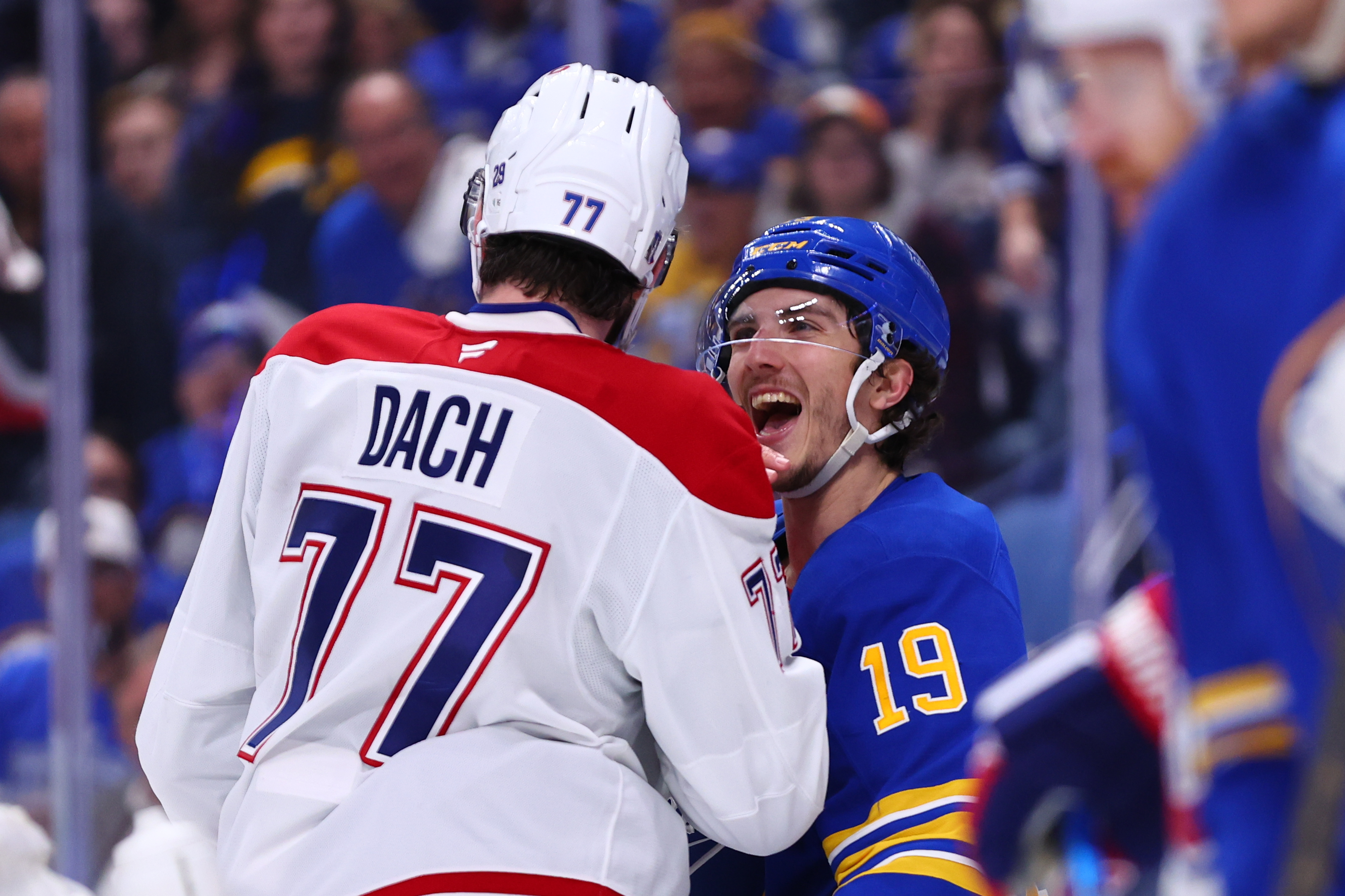 Peyton Krebs of the Buffalo Sabres and Kirby Dach of the Montreal Canadiens