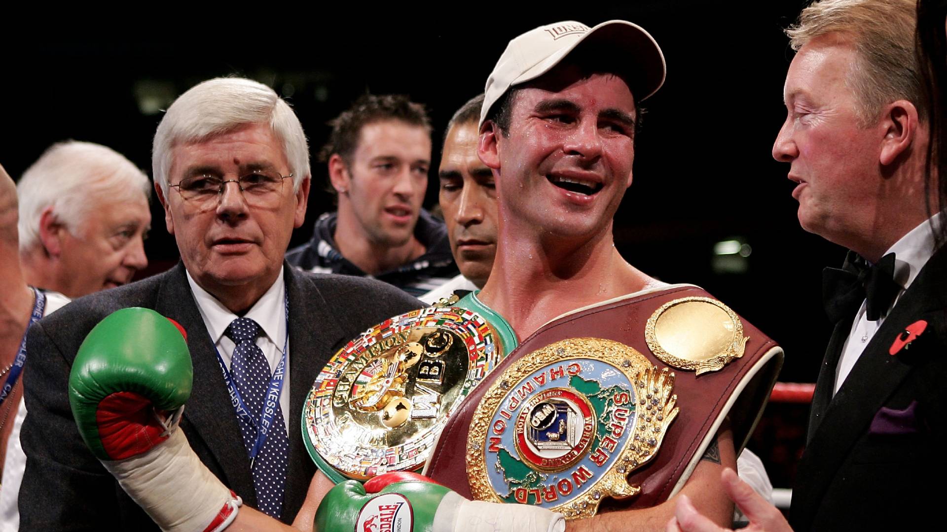 Joe Calzaghe celebrates after being declared winner of the super-middleweight title unification fight against Mikkel Kessler