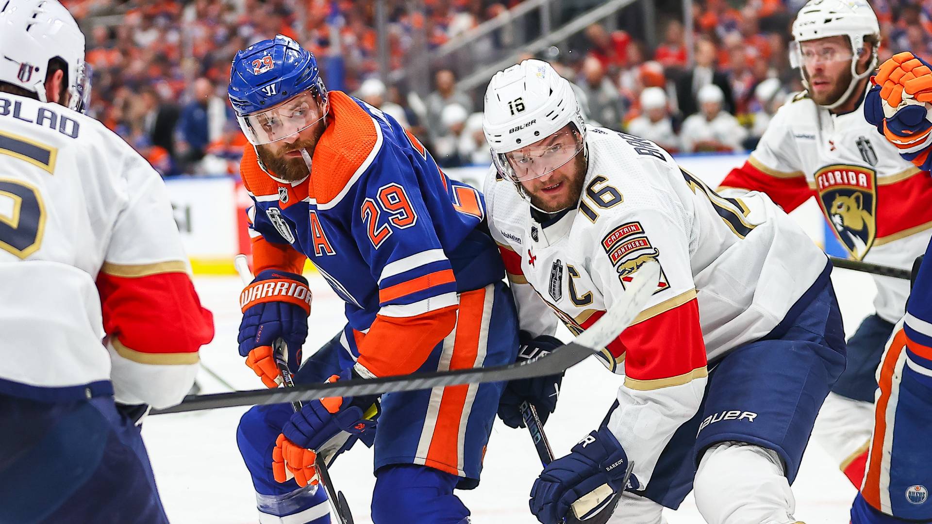 Edmonton Oilers Center Leon Draisaitl (29) and Florida Panthers Center Aleksander Barkov (16) battle for a face off in the first period of game four of the Stanley Cup Final