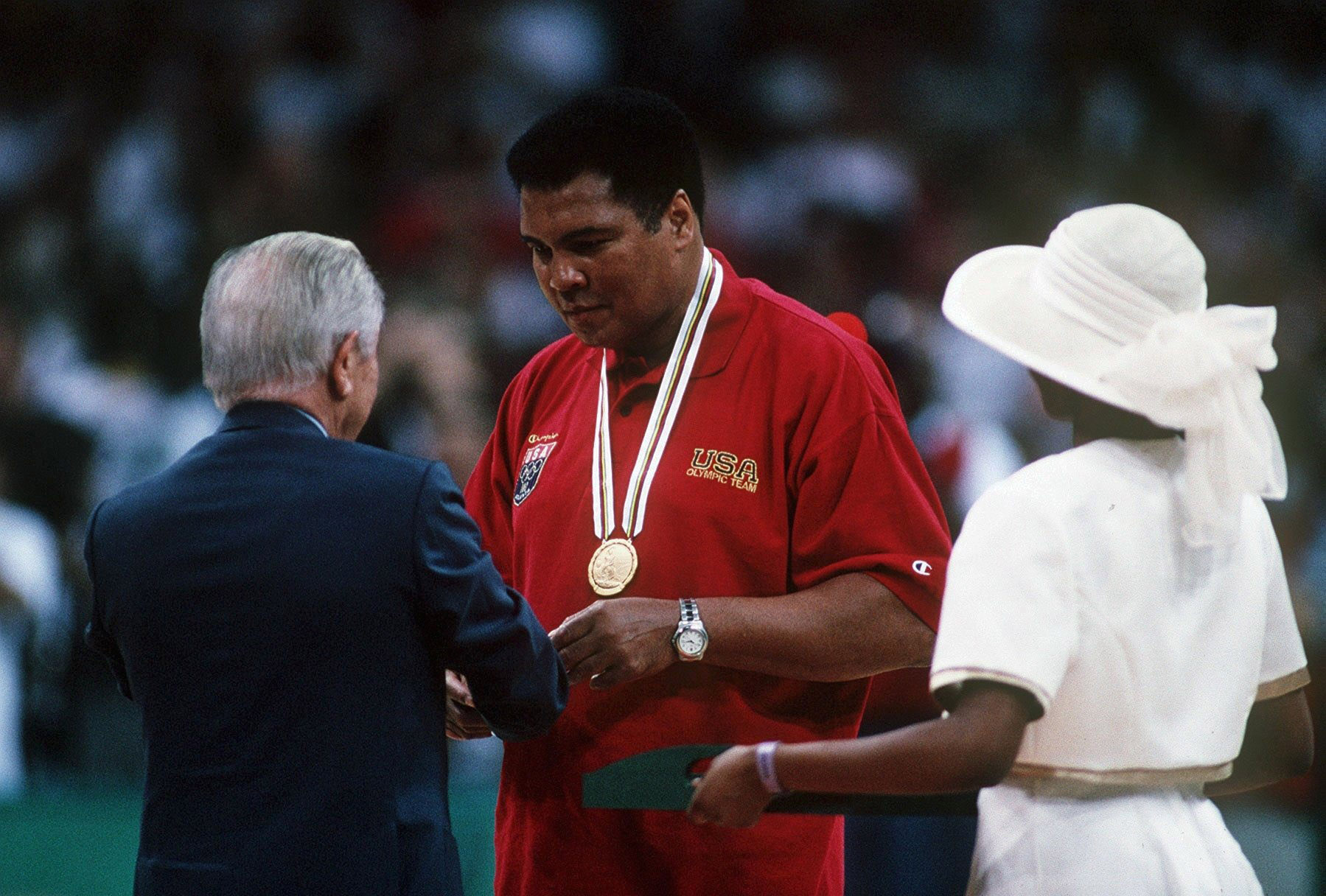 Muhammad Ali receives his replacement Olympic gold medal