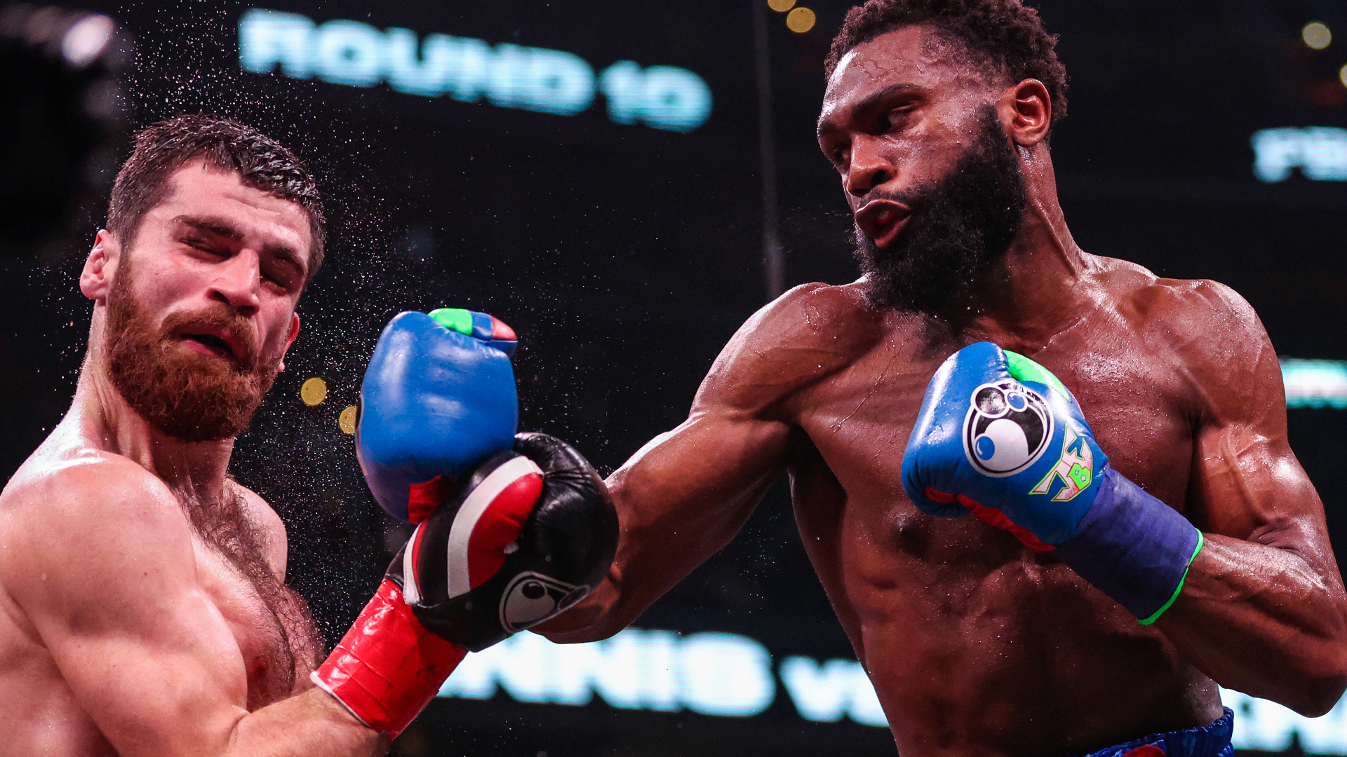 Jaron Ennis punches Karen Chukhadzhian