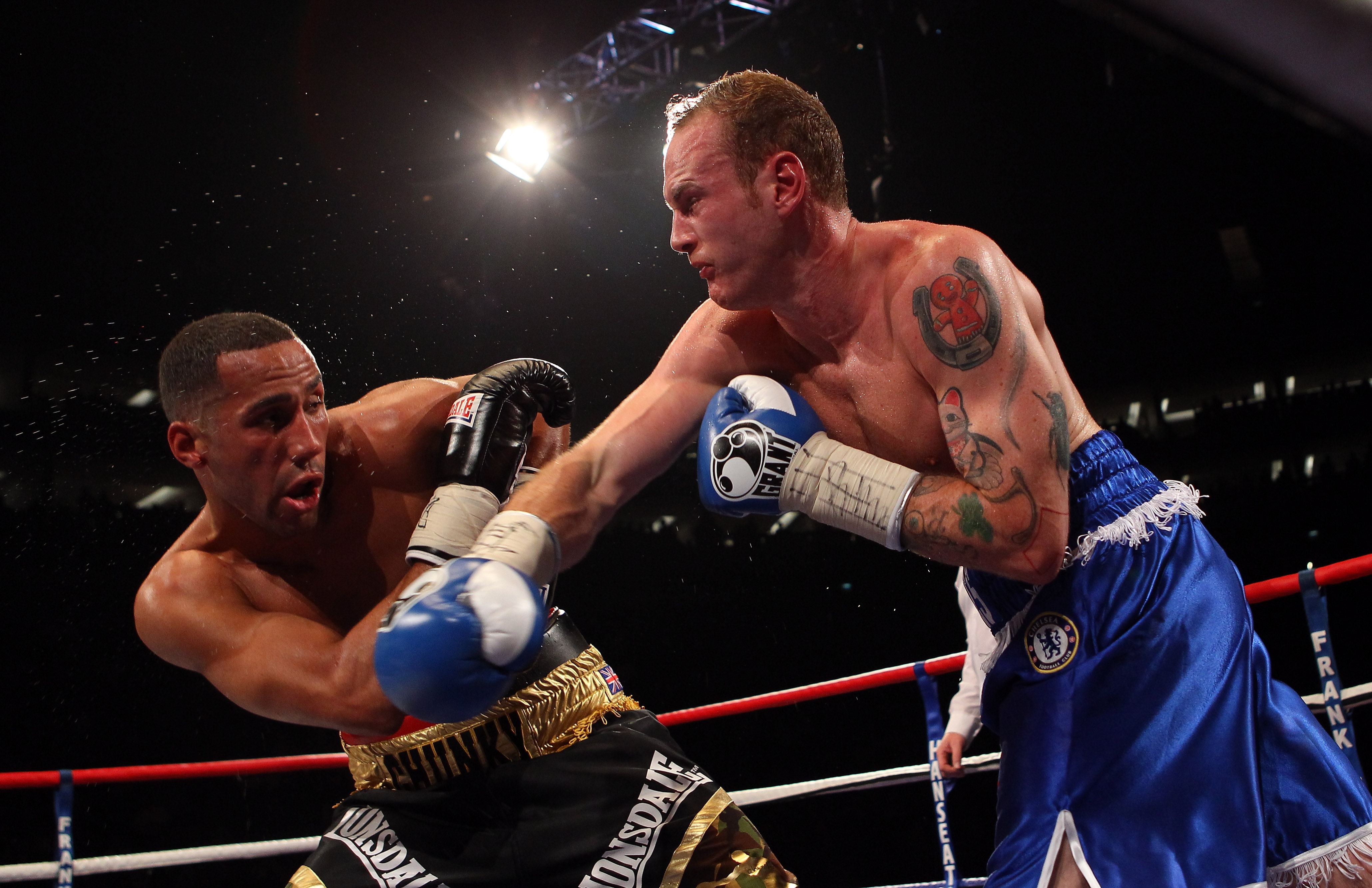 James DeGale (L) of England fights George Groves of England in the British and Commonwealth Super-Middleweight Championship