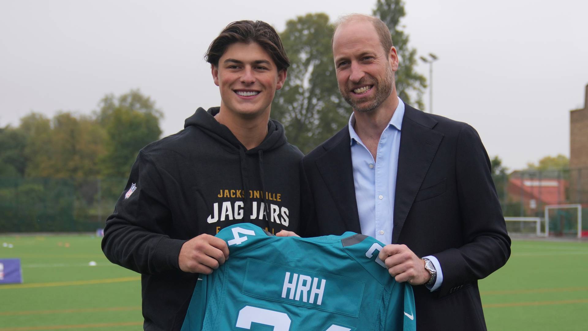 Prince William, Prince of Wales poses with Louis Rees-Zammit