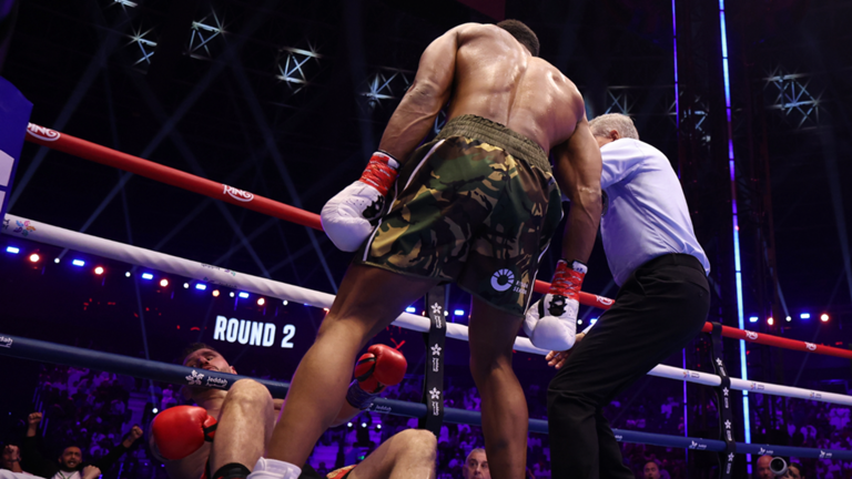 Anthony Joshua rebounds to knock out Kristian Prenga and secures all-British superfight with Tyson Fury