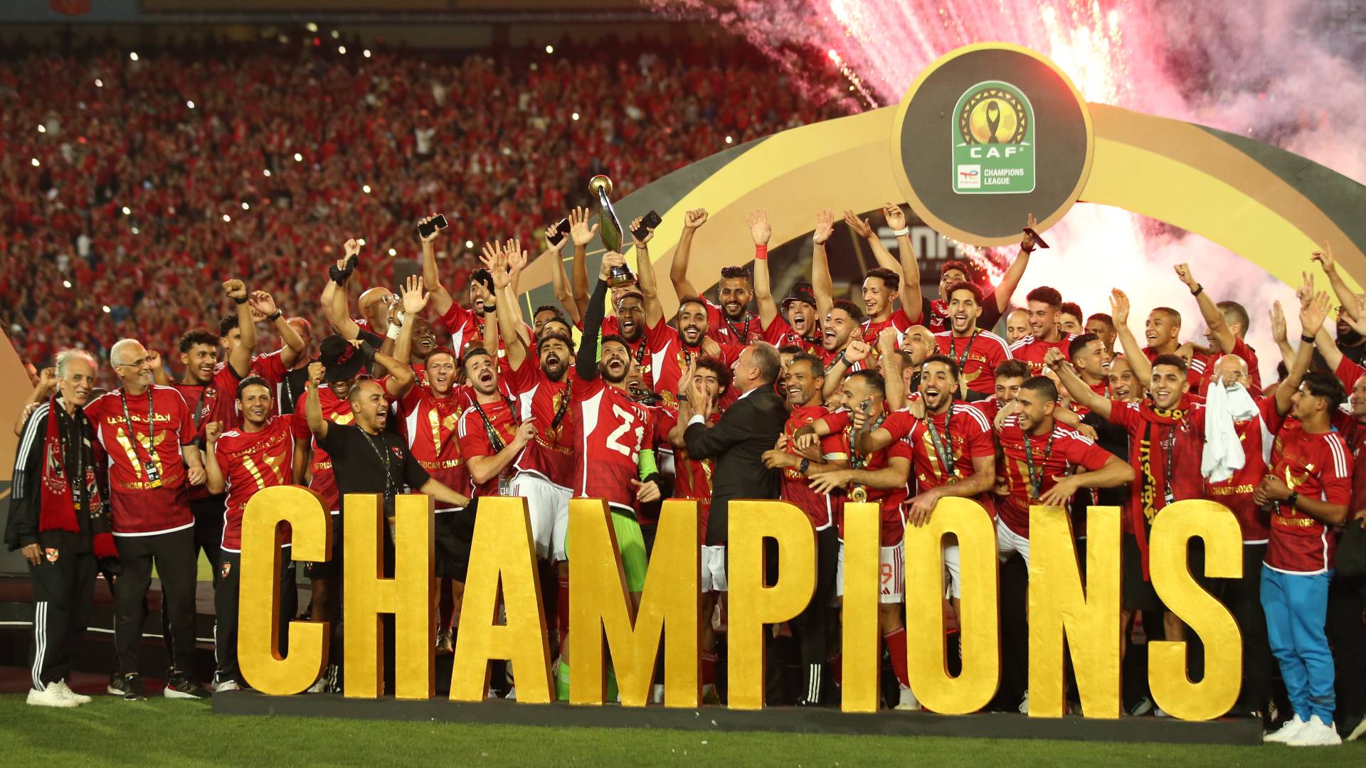 Al Ahly celebrate with the trophy after winning the CAF Champions League title