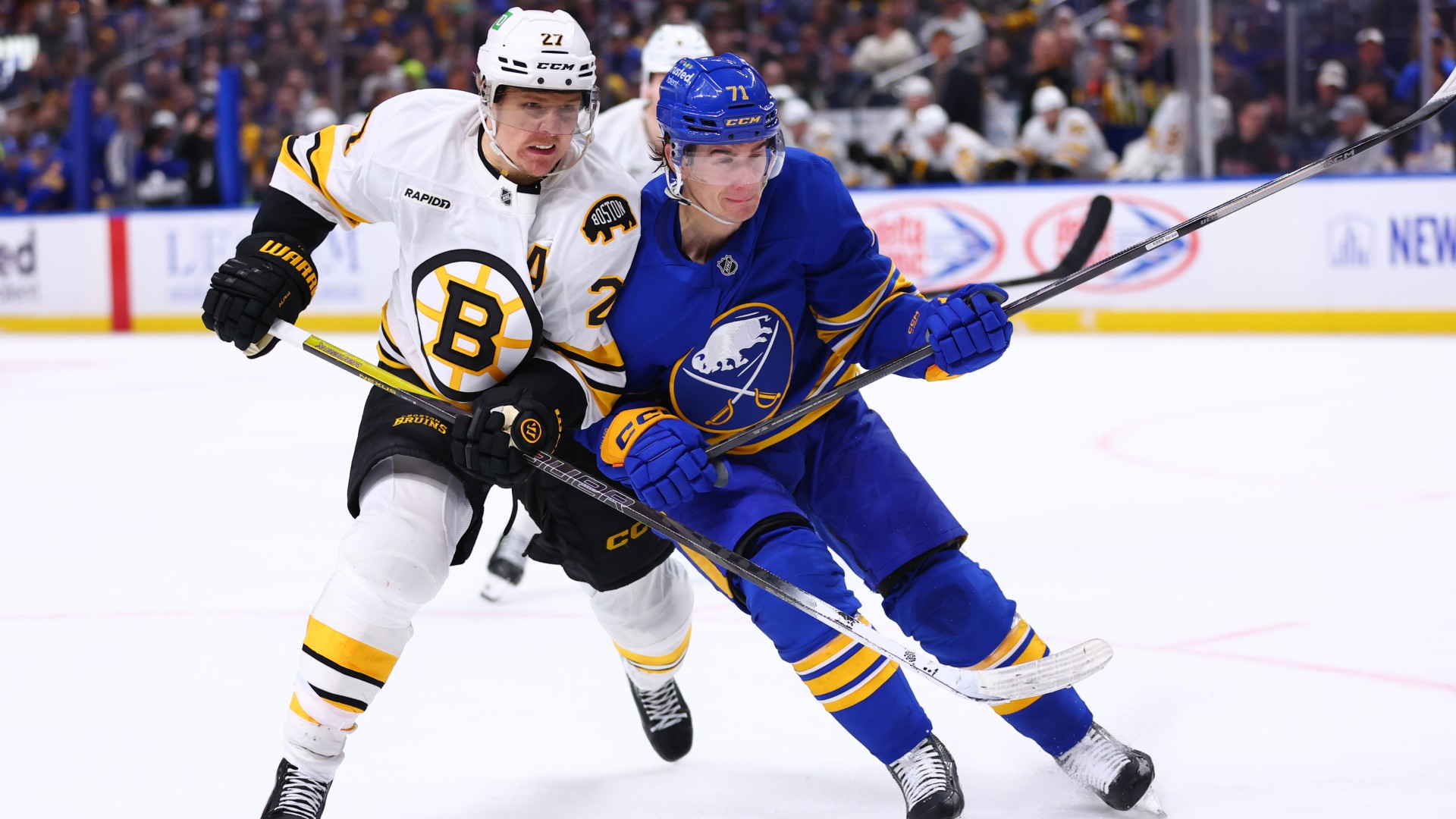 Hampus Lindholm #27 Boston Bruins Ryan McLeod #71 Buffalo Sabres NHL 25032026