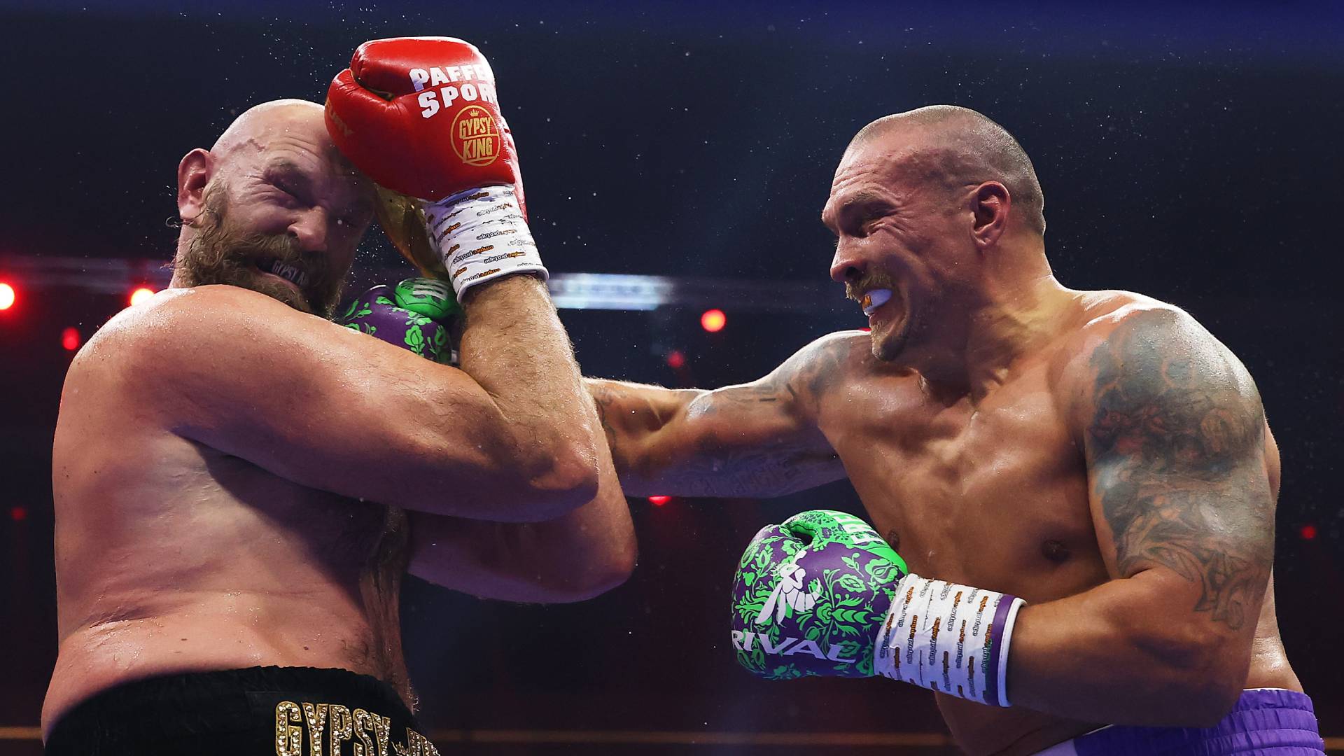 Oleksandr Usyk punches Tyson Fury