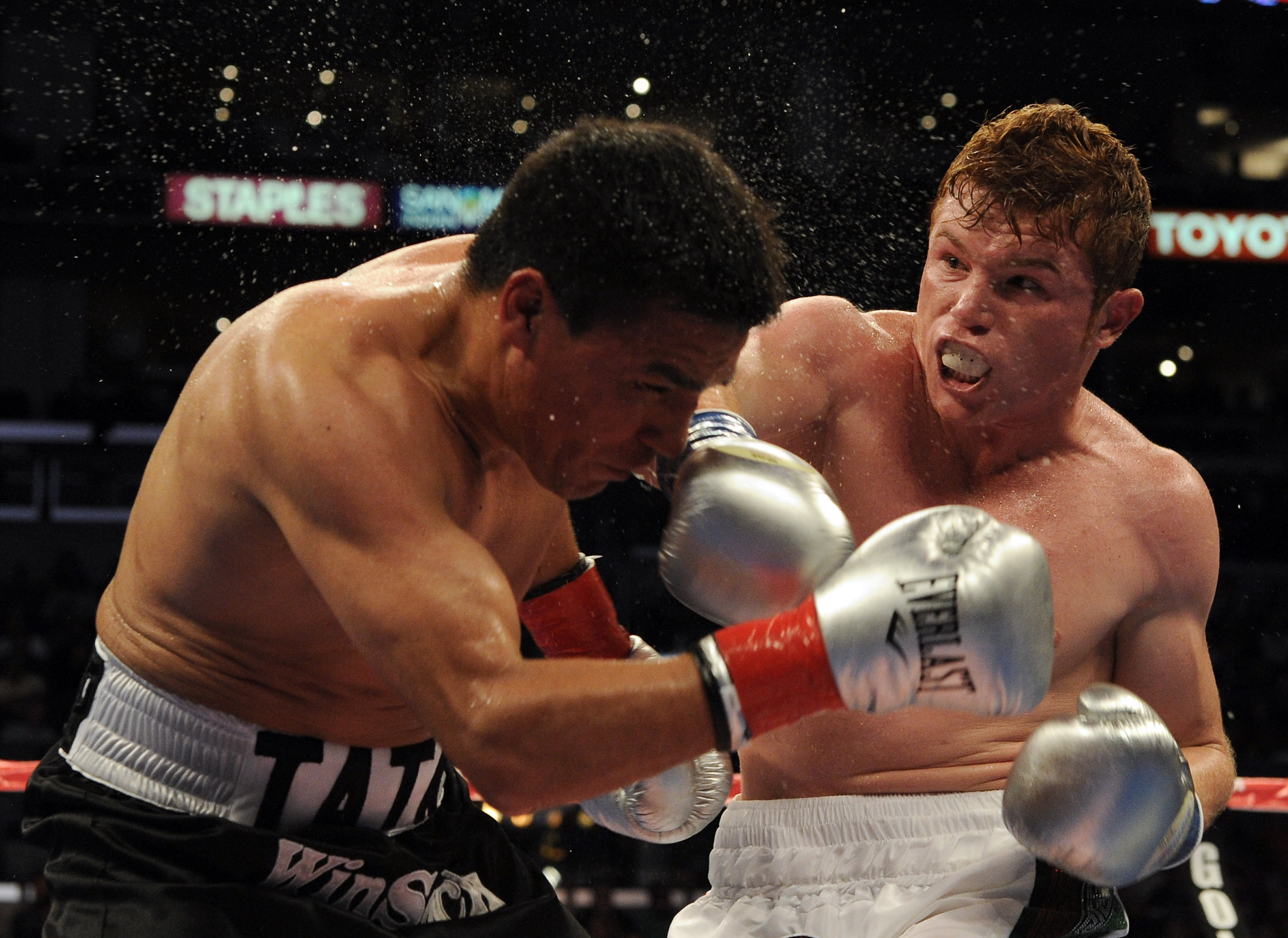 Saul Alvarez of Mexico hits Carlos Baldomir of Argentina in the WBC Super Welterweight Silver Title