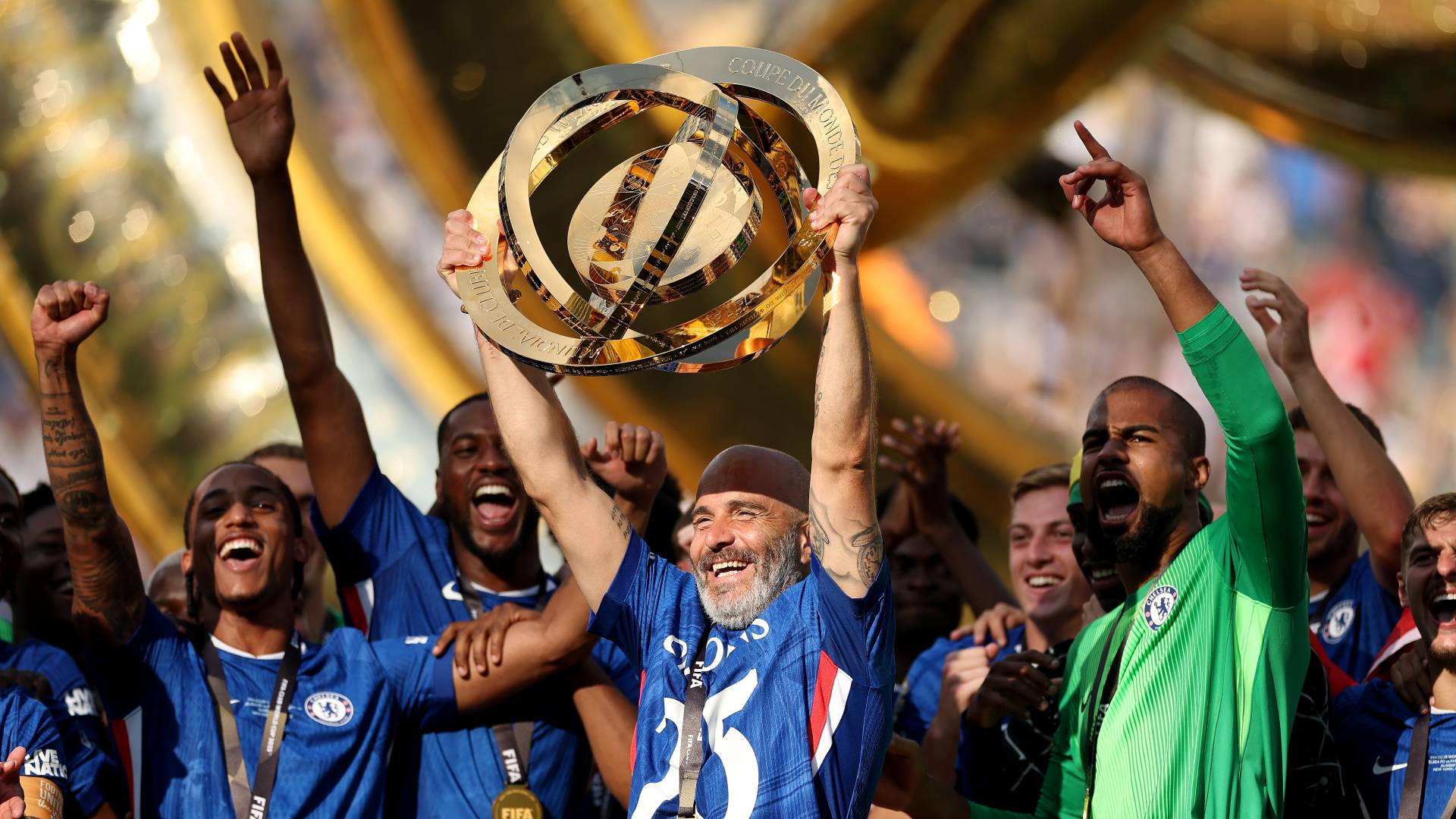 Enzo Maresca, Head Coach of Chelsea FC, lifts the FIFA Club World Cup trophy