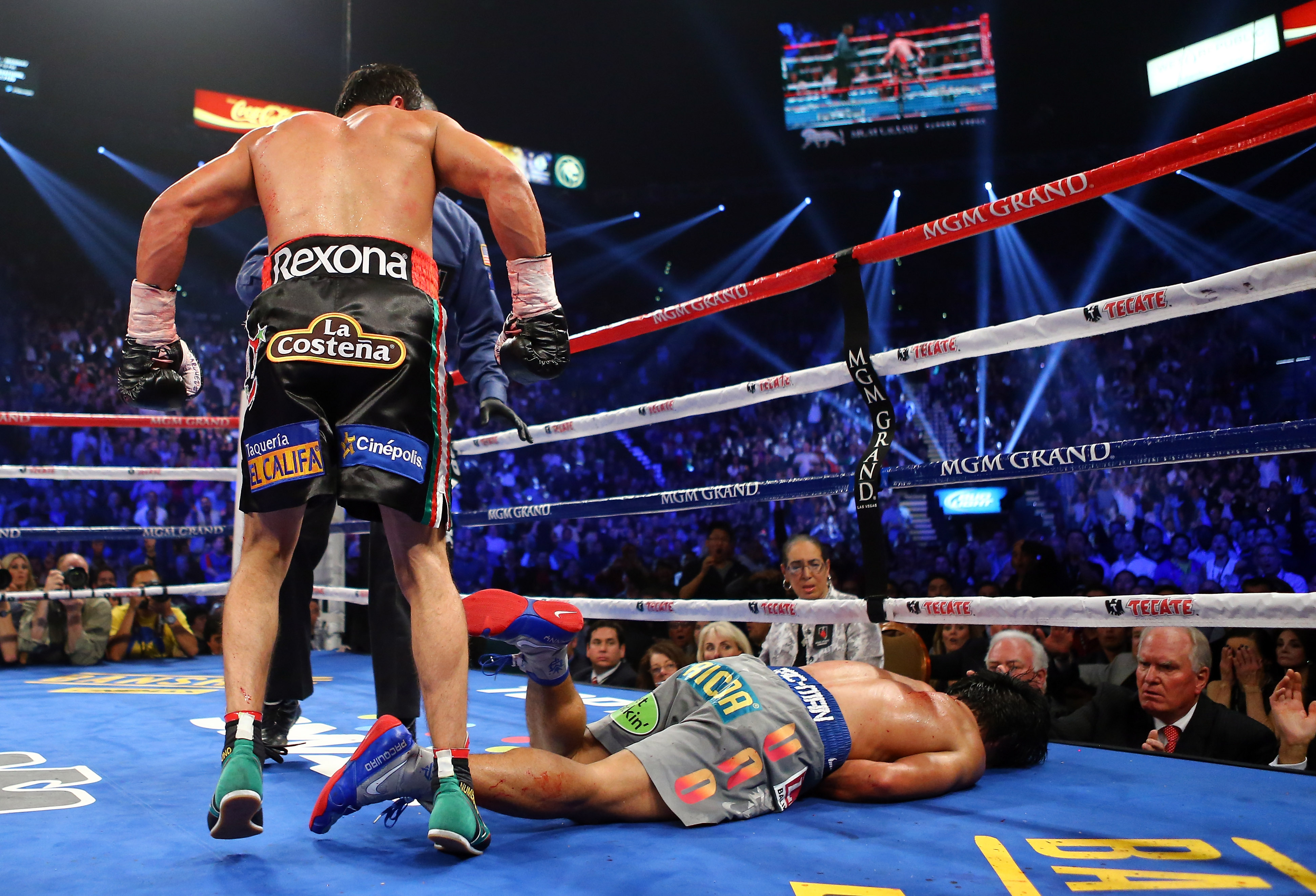 Manny Pacquiao lays face down on the mat after being knocked out in the sixth round by Juan Manuel Marquez