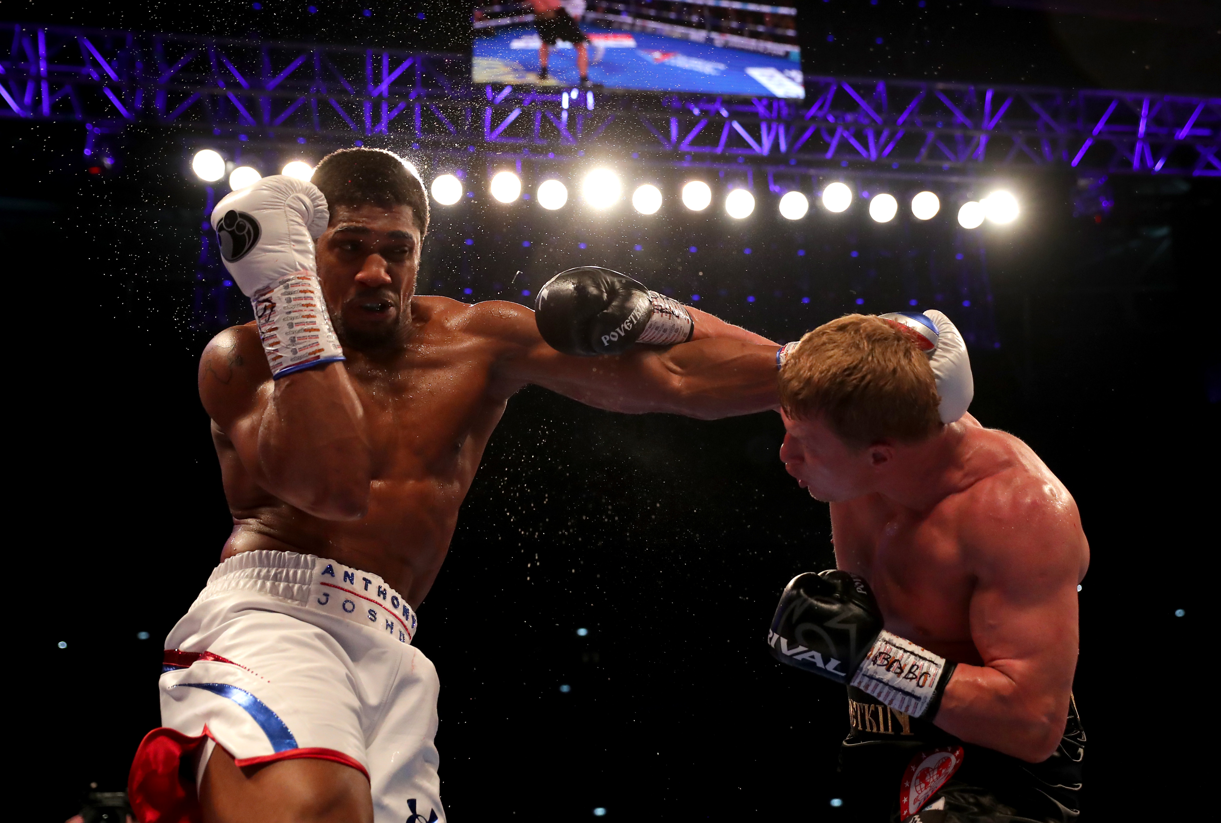 Anthony Joshua and Alexander Povetkin exchange punches