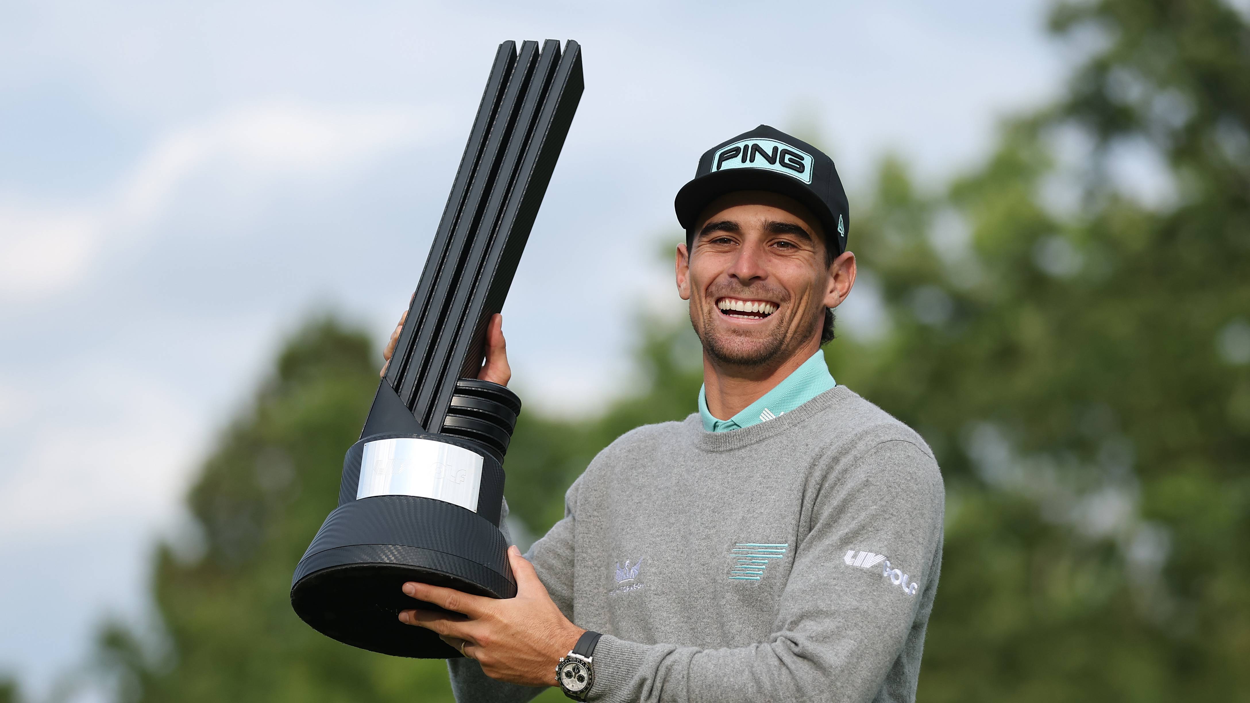 Joaquin Niemann of Torque GC poses with the individual trophy on day three of LIV Golf UK by JCB at JCB Golf & Country Club
