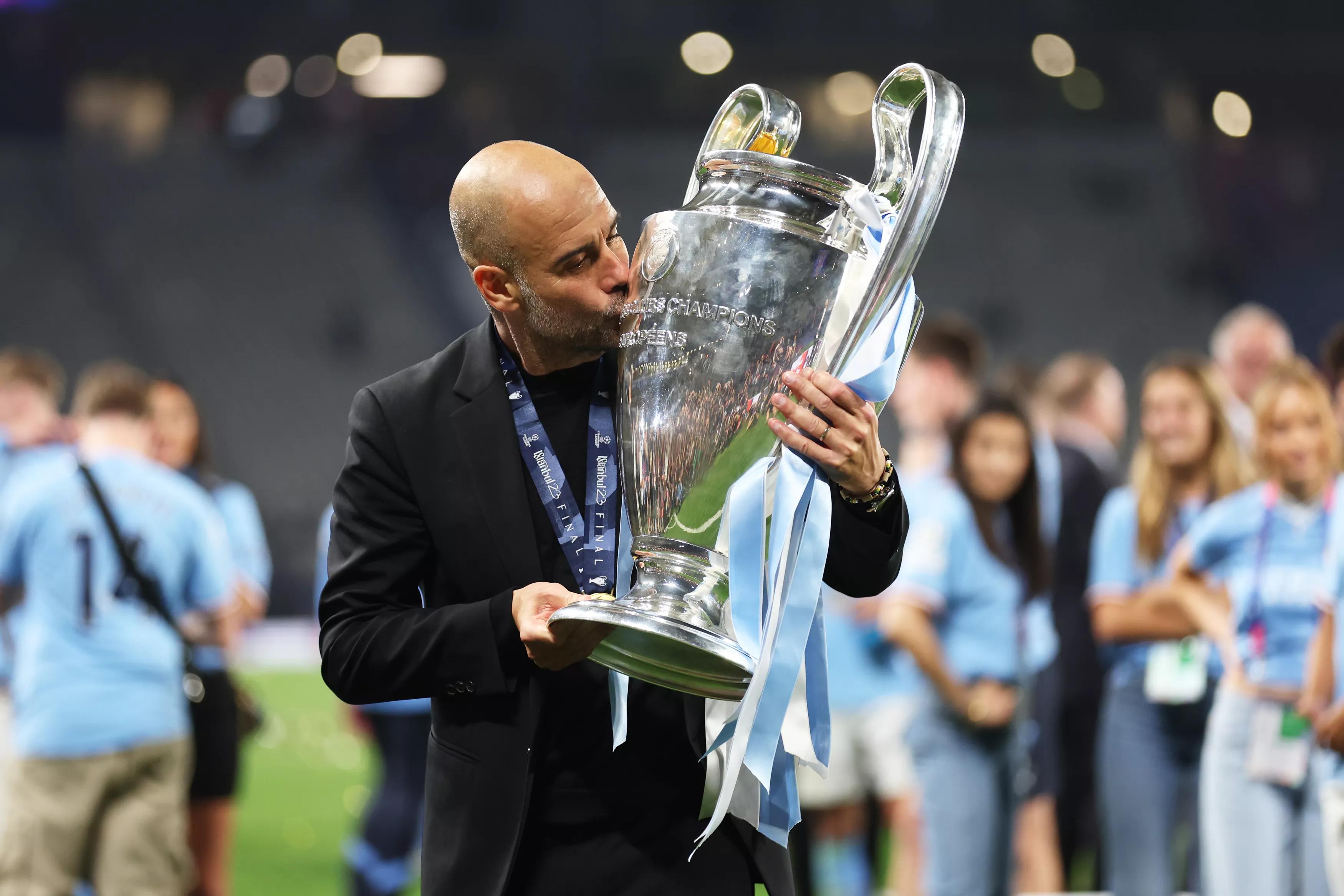 transform-7ad7aac8-c748-4cca-af3e-cb7e05d89071-Pep-Guardiola-with-CL-trophy