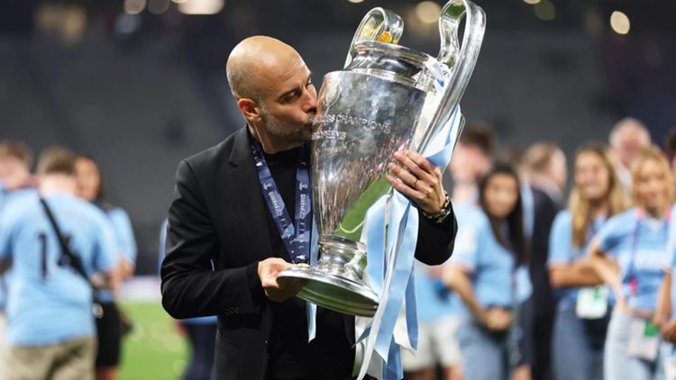 transform-7ad7aac8-c748-4cca-af3e-cb7e05d89071-Pep-Guardiola-with-CL-trophy