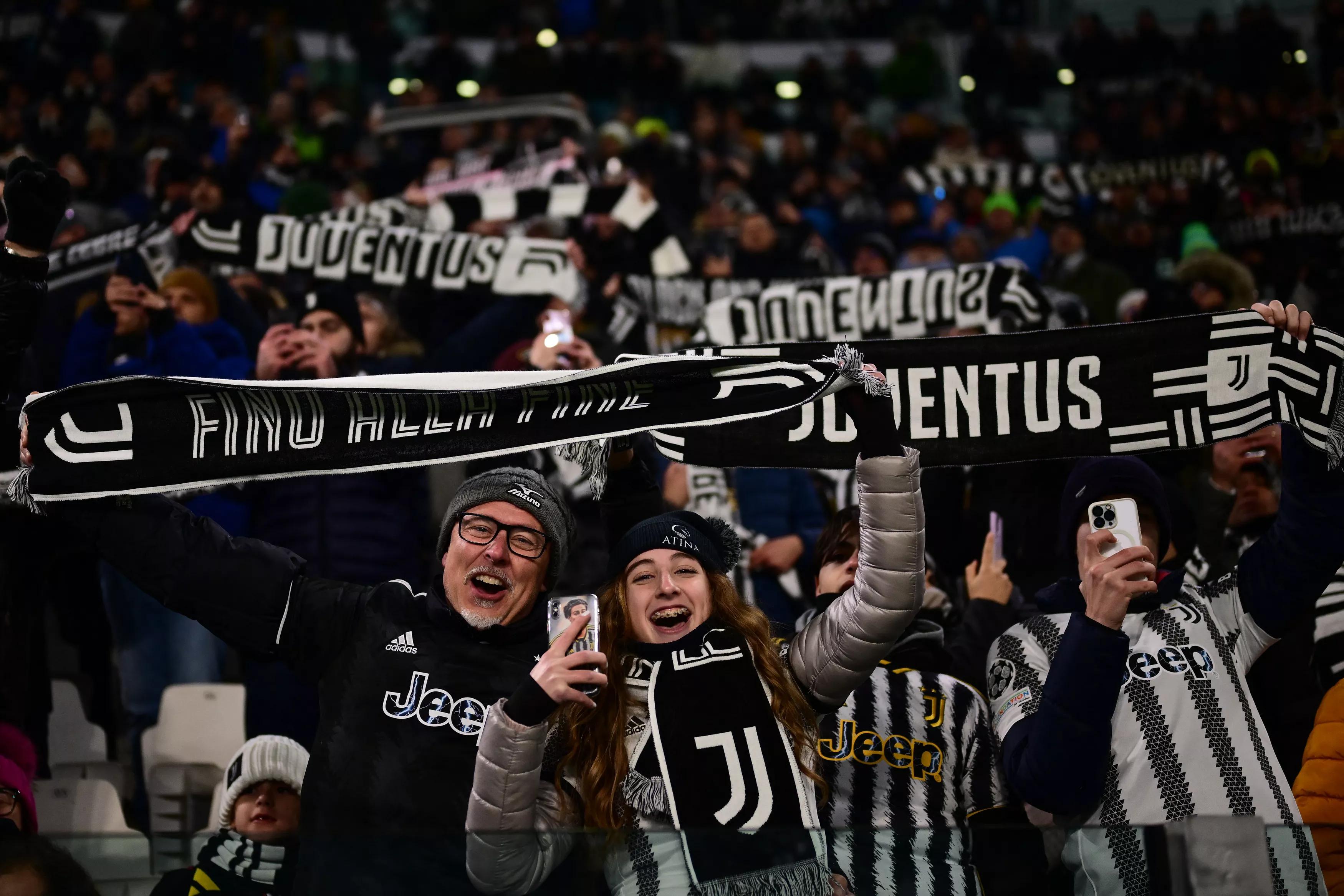 transform-ba312e2e-3354-4fab-a7e9-6cf730d050ca-Juventus-supporters-cheer-during-the-Italian-Serie-A-football-match-between-Juventus-and-Napoli-at-The-Allianz-Stadium-in-Turin-on-December-8-2023