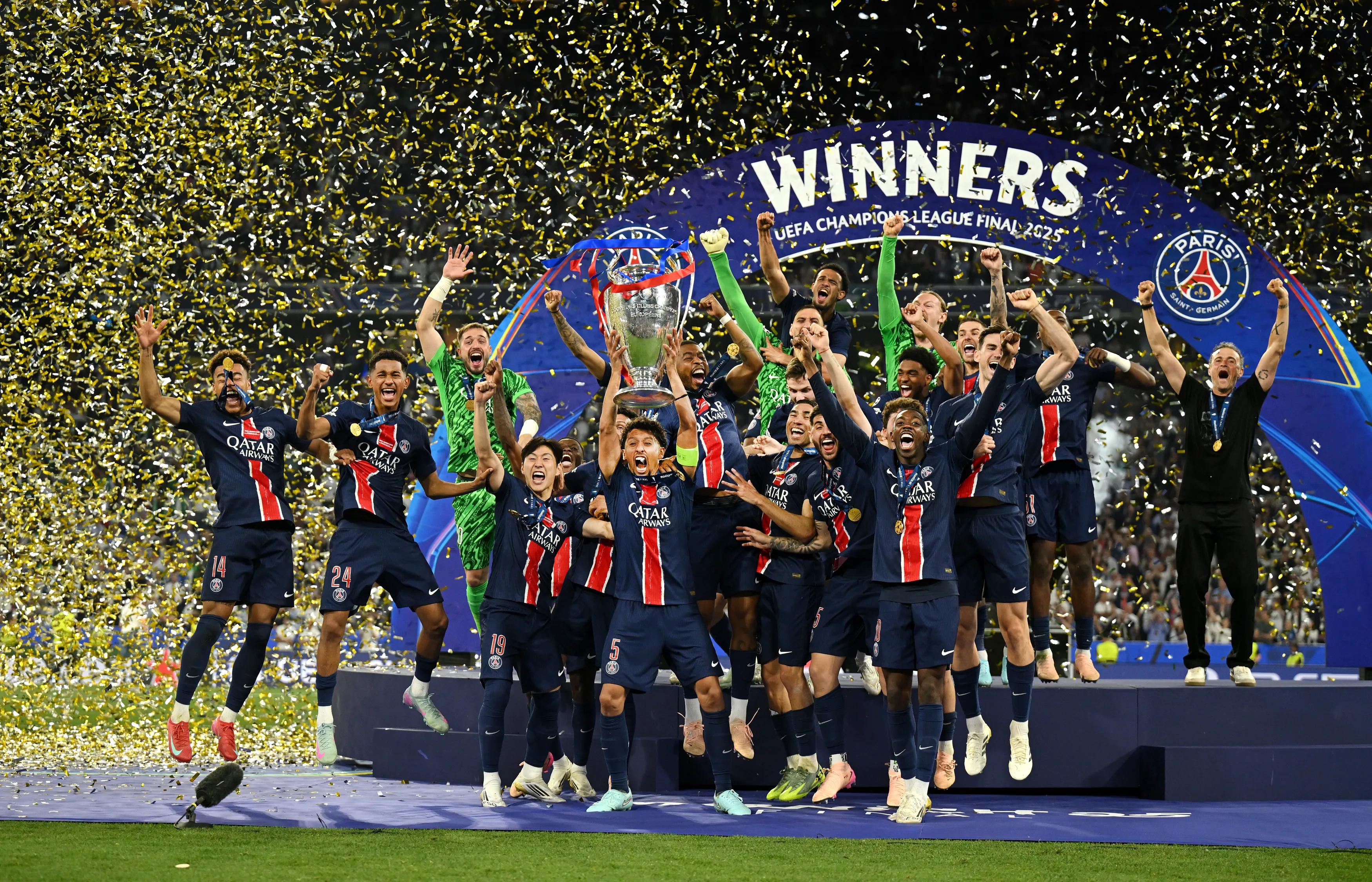 transform-a1d6805c-7280-4f26-9c56-6f0638a894dd-Marquinhos-of-Paris-Saint-Germain-lifts-the-UEFA-Champions-League-trophy-after-his-team-s-victory-over-FC-Internazionale-Milano-at-Munich-Football-Arena-