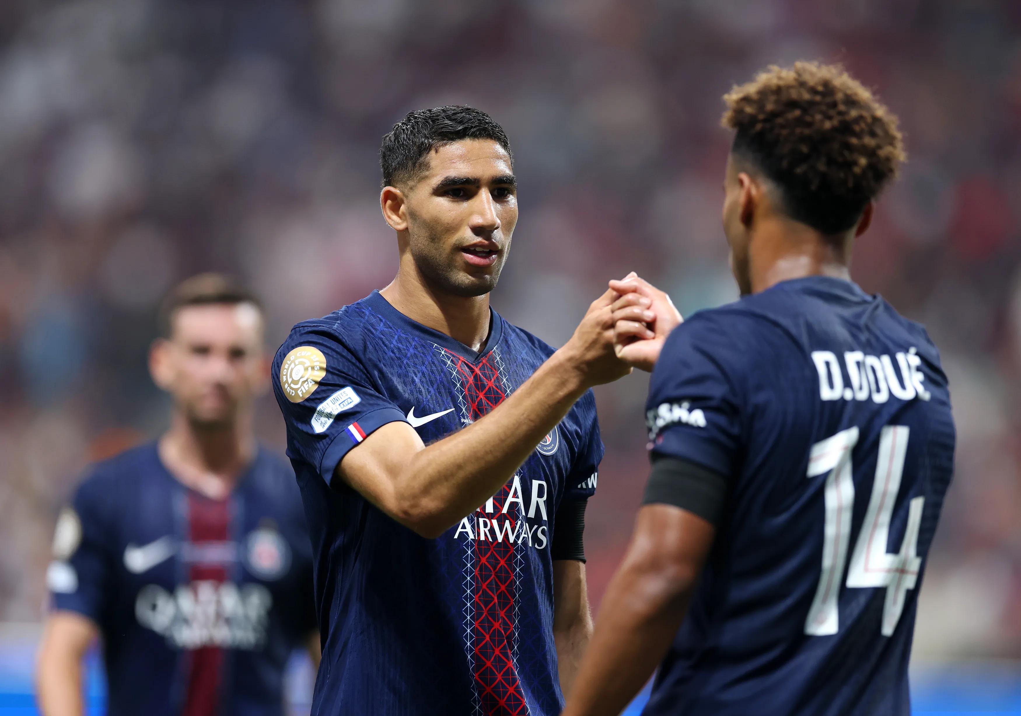 transform-040f81c5-48ae-488c-bb2e-e794f2f5a1ea-Hakimi-celebrates-with-Doue