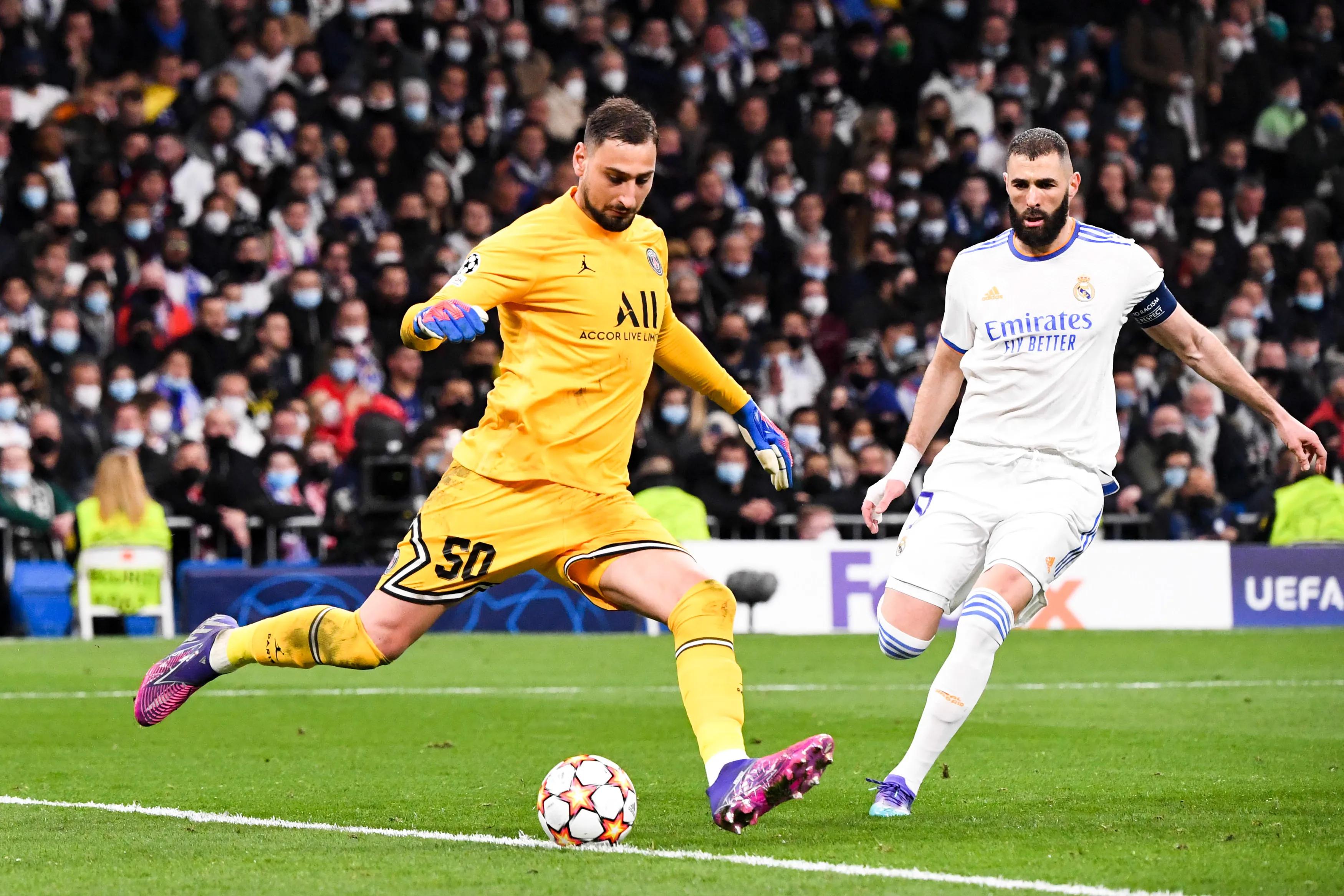transform-ea7350ee-9a89-4a7d-8cc2-b3d68b4284c1-09-Karim-BENZEMA-real-50-Gianluigi-DONNARUMMA-psg-during-the-UEFA-Champions-League-match-between-Real-Madrid-and-Paris-at-Estadio-Santiago-Bernabeu-on-Ma