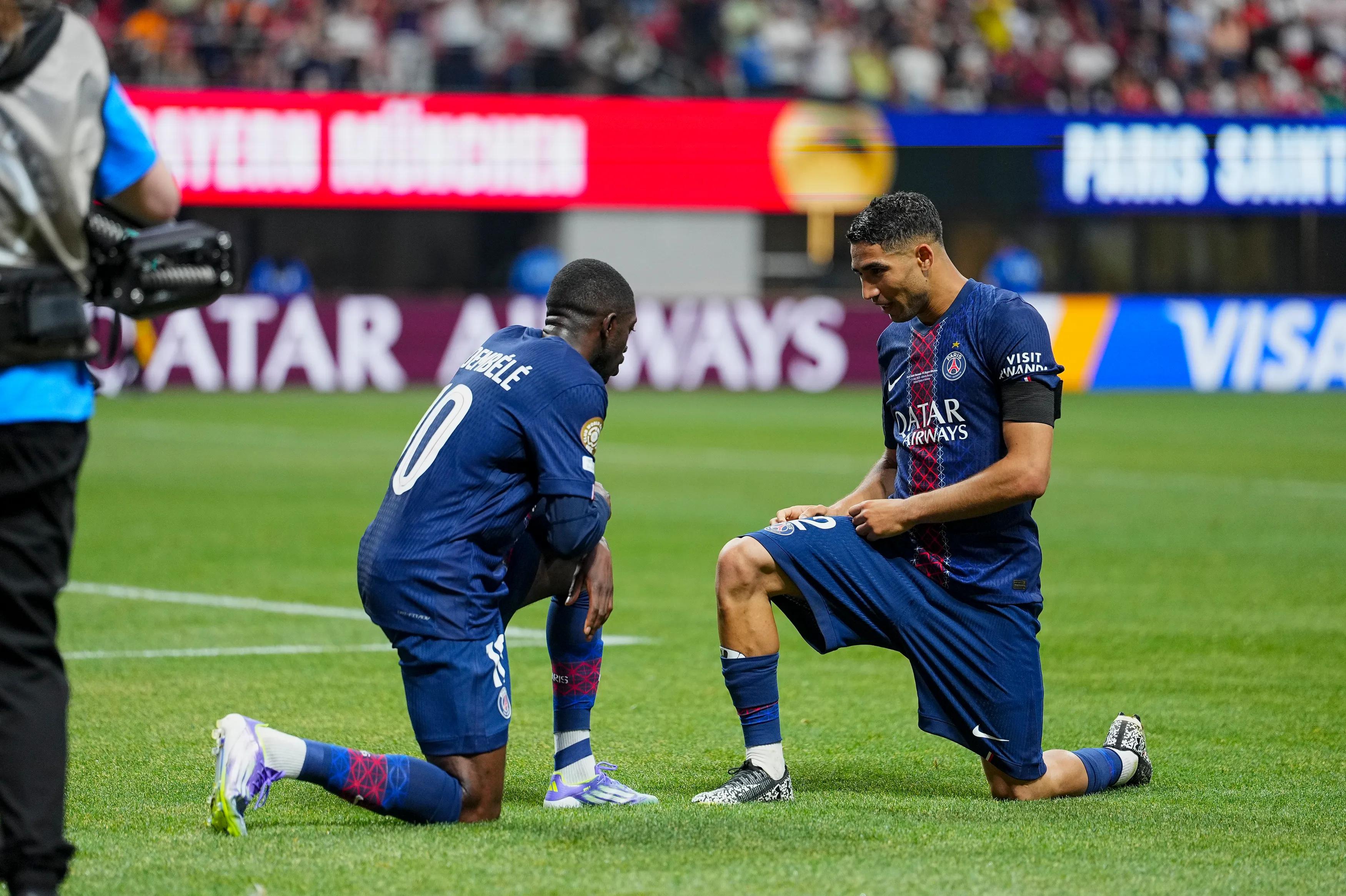 transform-80c7bae2-2a9c-4120-a882-056306f81d1c-Hakimi-celebrates-with-Dembele-PSG-vs-Bayern-Munich