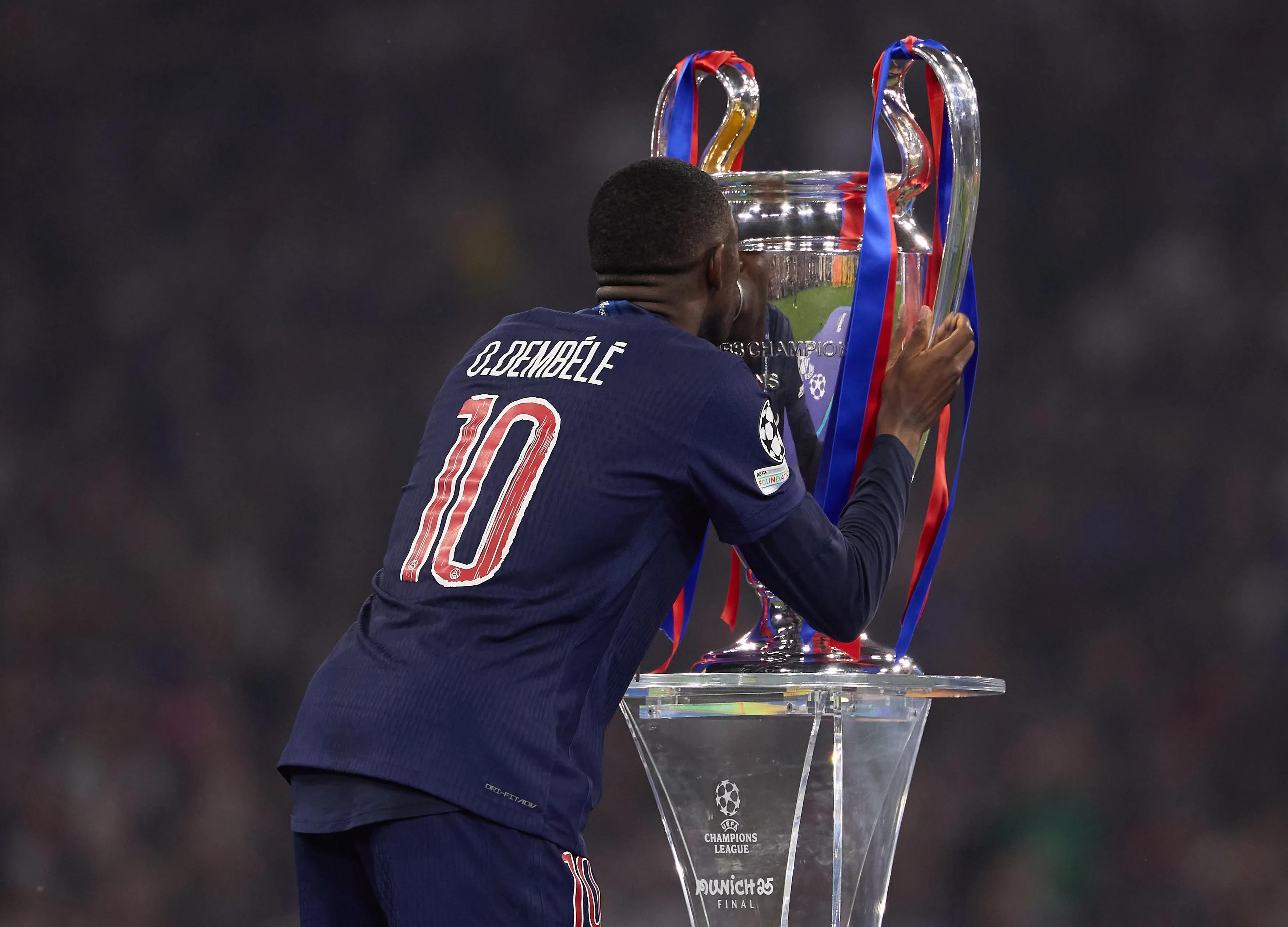 transform-fd31961f-b128-4461-b627-7e3849734023-Dembele-kiss-Champions-League