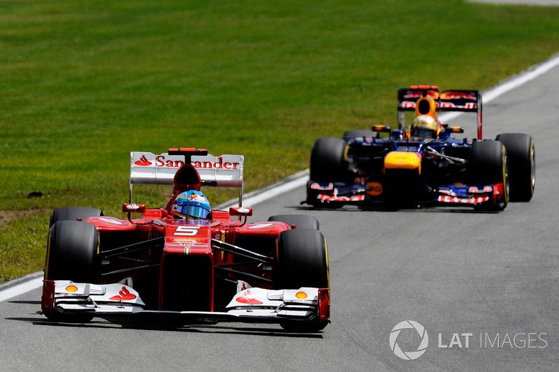 images-mgl-2QweMLa6-s1000-f1-german-gp-2012-fernando-alonso-ferrari-f2012-ahead-of-sebastian-vettel-red-bull-racing
