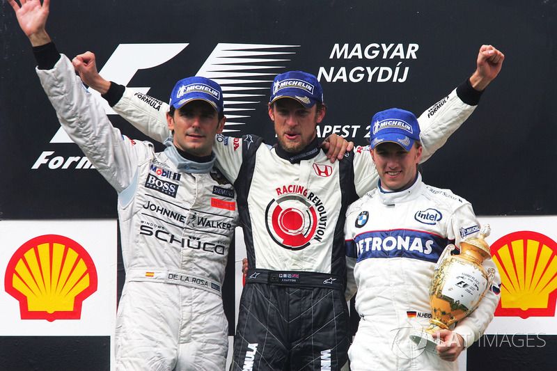 images-mgl-YBrwgklY-s1000-f1-hungarian-gp-2006-podium-second-place-pedro-de-la-rosa-mclaren-race-winner-jenson-butto