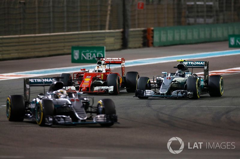 images-mgl-0R55ejv6-s1000-f1-abu-dhabi-gp-2016-sebastian-vettel-ferrari-sf16-h-battles-with-nico-rosberg-mercedes-f1