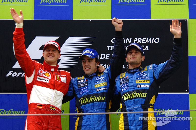 static-img-mgl-300000-350000-355000-355100-355164-s1000-f1-spanish-gp-2006-podium-race-winner-fernando-alonso-with-michael-schumacher-and-giancarl