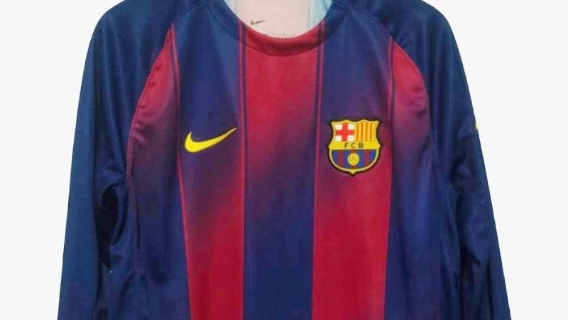 images-v3-bltc55f3a235aa734f1-crop-MM5DQMBQHI2DKMB2NZXXOZJ2HE3DUMJRHA======-barcelona-25-26-home-kit-1