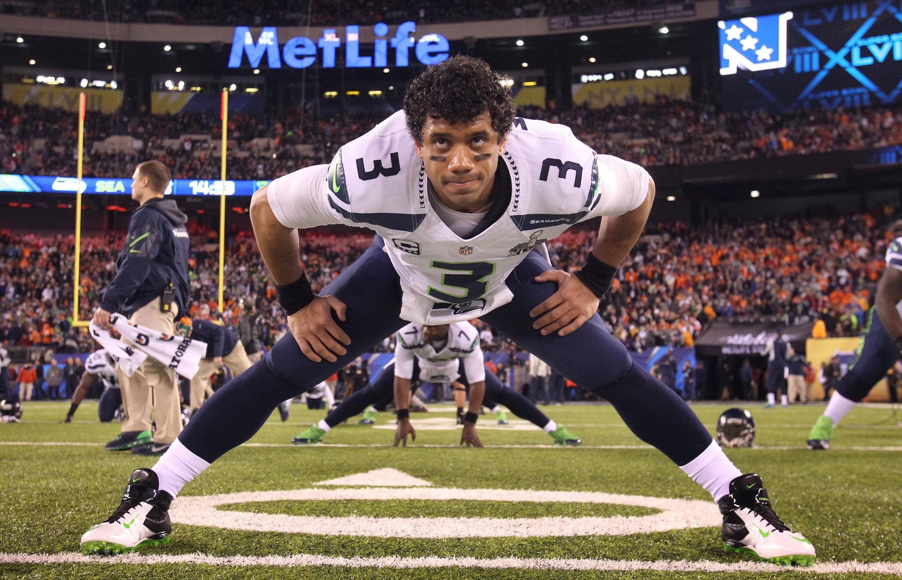 transform-c3109f17-85d7-445d-aae9-18e0a9d65bfb-Feb-2-2014-East-Rutherford-NJ-USA-Seattle-Seahawks-quarterback-Russell-Wilson-stretches-out